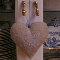 padded heart hanging ornament made in the machine embroidery hoop lavender filled linen heart needle passion embroidery npe